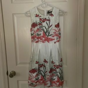 Sleeveless dress with tags